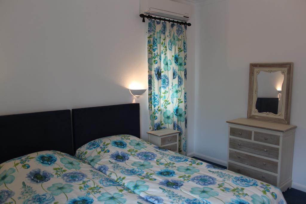 Alto Club Apartments Алвор Стая снимка
